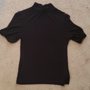 3/$20.   Solid black short sleeve top.